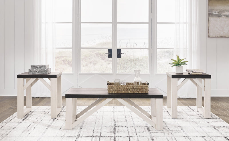 Set of three Ashley Furniture Dorrinson tables in natural wood finish, showcasing modern living room decor.