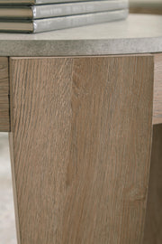 Set of three Ashley Furniture Guystone tables with sleek finish, showcasing modern, versatile side tables for living spaces.