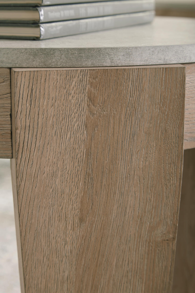Set of three Ashley Furniture Guystone tables with sleek finish, showcasing modern, versatile side tables for living spaces.