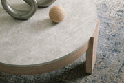 Set of three Ashley Furniture Guystone tables showing detailed close-up of textured stone surfaces and sleek designs.