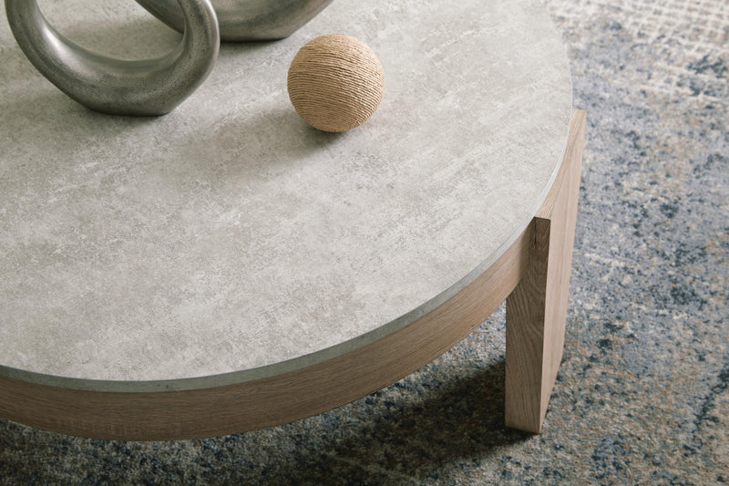 Set of three Ashley Furniture Guystone tables showing detailed close-up of textured stone surfaces and sleek designs.