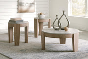 Set of three Ashley Furniture Guystone tables featuring modern design with textured stone surfaces and sleek black metal legs.