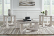 Set of three Garnilly tables by Ashley Furniture, modern wooden side tables with sleek design and natural wood finish.