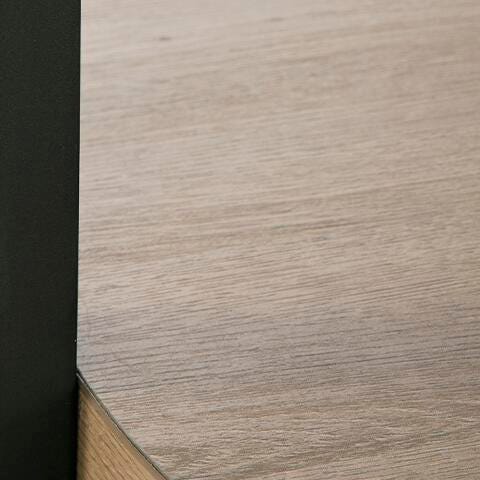 Set of three Ashley Furniture Darthurst tables with dark wood finish, featuring sleek, modern bases in a coordinated design.