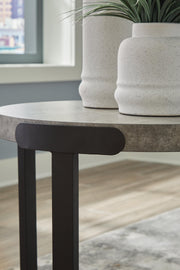 Set of three Ashley Furniture Darthurst tables, featuring modern wooden tabletops and sleek metal legs, arranged together.