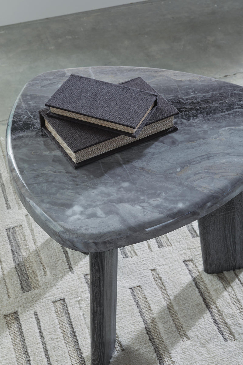 Set of three Ashley Furniture Bluebond tables with detailed tops, showcasing modern design and natural wood finishes.