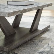 Set of three Bensonale tables from Ashley Furniture featuring modern wooden designs and sleek tabletops.