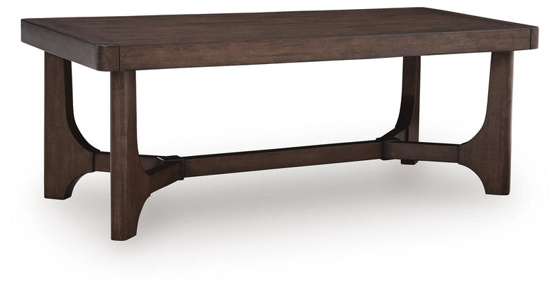 Ashley Furniture Korestone living room occasional table set with three modern tables featuring wood and metal finishes.