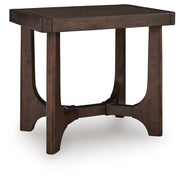 Ashley Furniture Korestone living room occasional table set with three modern tables in a contemporary living space.
