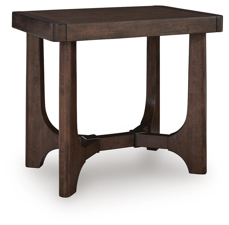 Ashley Furniture Korestone living room occasional table set with three modern tables in a contemporary living space.