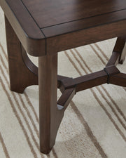Ashley Furniture Korestone occasional table set for living room, featuring three stylish tables with wood finish and modern design.