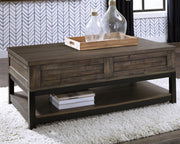 Ashley Furniture Johurst coffee table with lift top, modern cocktail table featuring a sleek design and functional lift mechanism.
