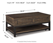 Ashley Furniture Johurst lift top coffee table with a modern design, featuring a lift-up top and storage space in a dark finish.