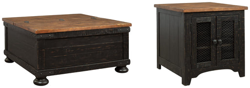 Ashley Furniture Valebeck table set featuring a wooden dining table with matching chairs and a modern, elegant design.