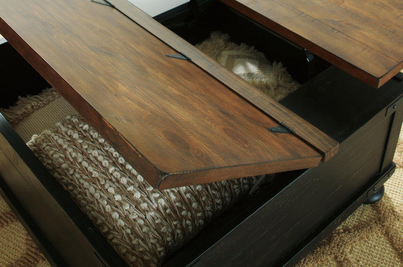 Close-up of Ashley Furniture Valebeck Table Set showing detailed wooden tabletop and elegant design elements.