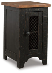 Ashley Furniture Valebeck occasional table set featuring two sleek, modern tables with wood finishes and metal accents.