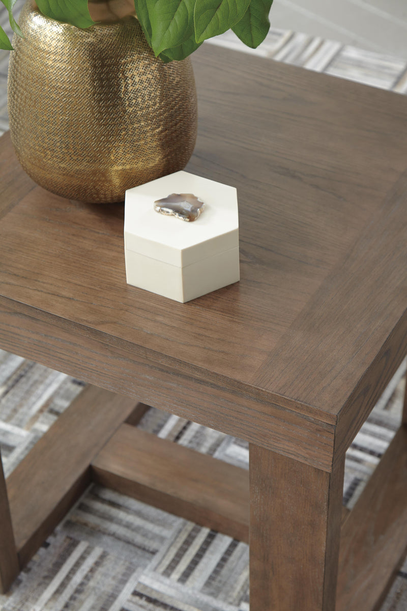 Ashley Furniture Cariton Occasional Table Set with two modern wooden tables featuring sleek finishes and sturdy legs.