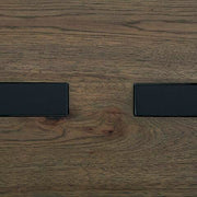 Ashley Furniture Kandinew end table with a sleek finish, featuring a modern design and smooth surface.