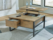 Ashley Furniture Montia Lift-Top Coffee Table with open lift-top revealing spacious storage area, modern design with wood finish.