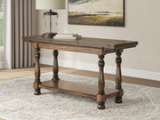 Ashley Furniture Sturlayne end table with a dark wood finish and sleek, modern design, featuring a spacious top and storage drawer.