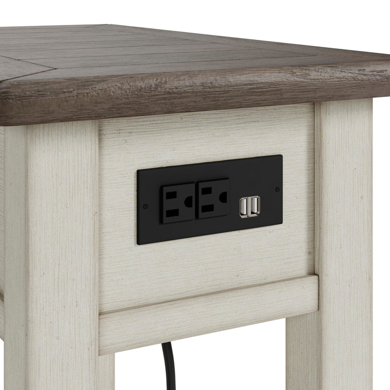 Ashley Furniture Bolanburg Occasional Table Set featuring two wood tables with metal accents and a warm finish.