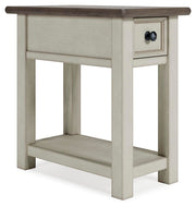 Ashley Furniture Bolanburg chairside end table with a square wooden surface and storage shelf, shown from an angled view.