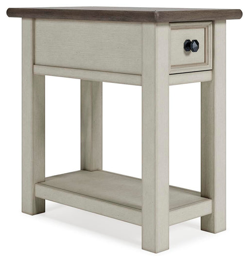 Ashley Furniture Bolanburg chairside end table with a square wooden surface and storage shelf, shown from an angled view.
