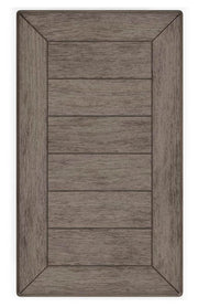 Ashley Furniture Bolanburg end table with a wooden top and sleek design, perfect for placing beside a chair or sofa.