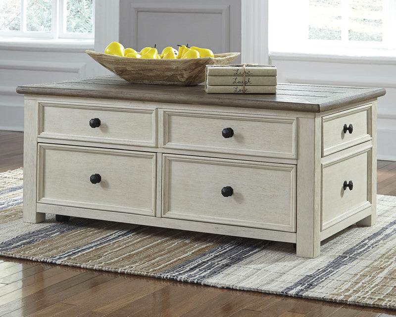 Ashley Furniture Bolanburg coffee table with lift top, showcasing its sleek design and functional lift mechanism in a modern living room setting.