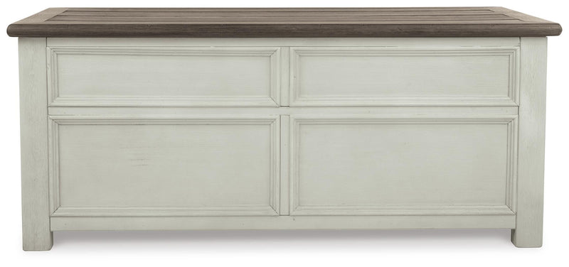 Ashley Furniture Bolanburg lift top coffee table with dark wood finish, featuring a spacious surface and storage compartment.