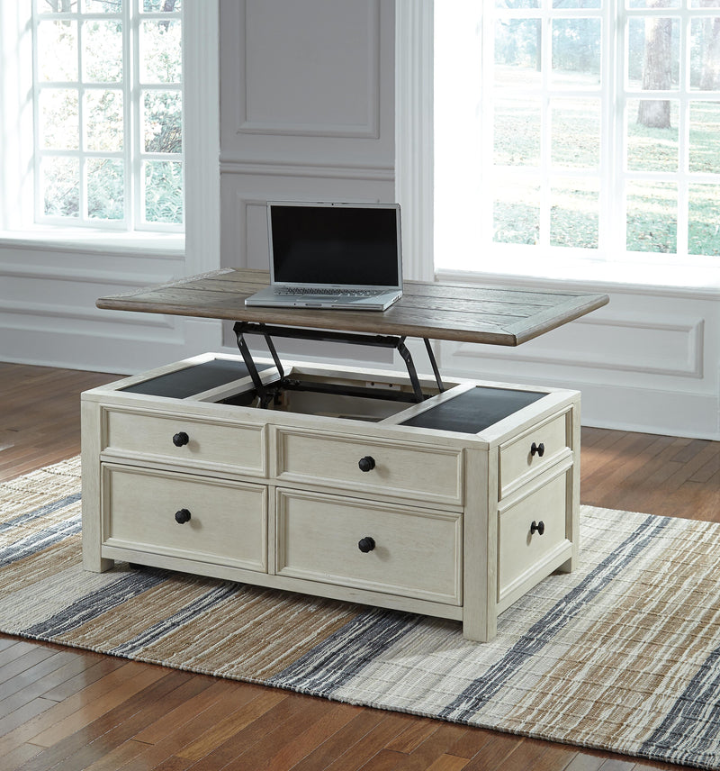 Ashley Furniture Bolanburg occasional table set with two matching tables featuring wood finishes and modern design.
