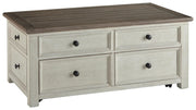 Ashley Furniture Bolanburg Occasional Table Set with two modern wooden tables featuring sleek design and warm finish.