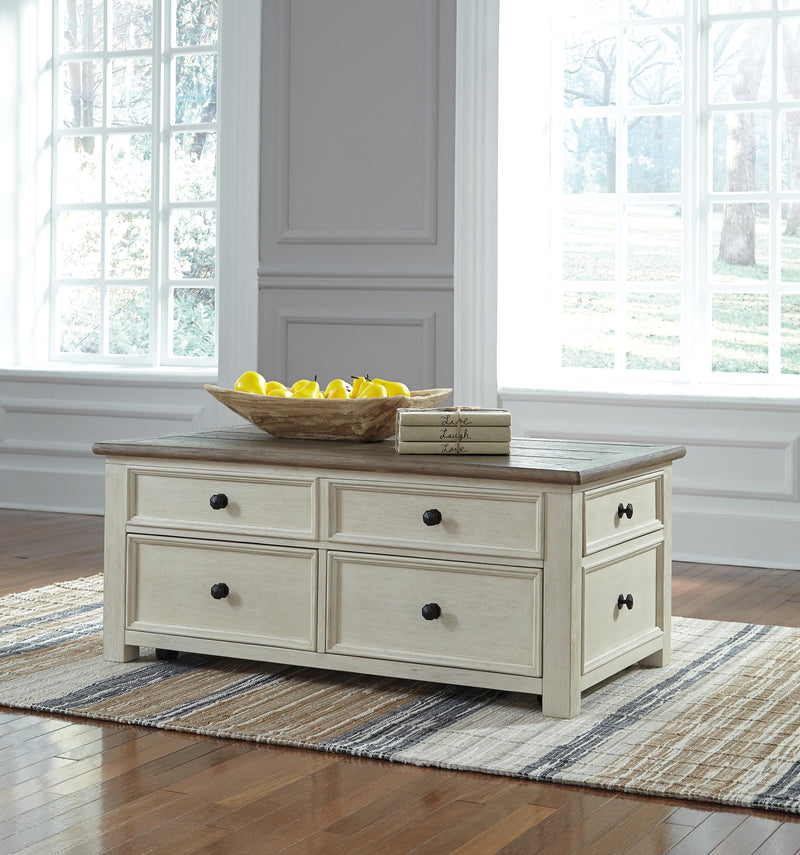 Bolanburg Ashley Furniture occasional table set with two matching wood tables featuring a warm finish and simple design.