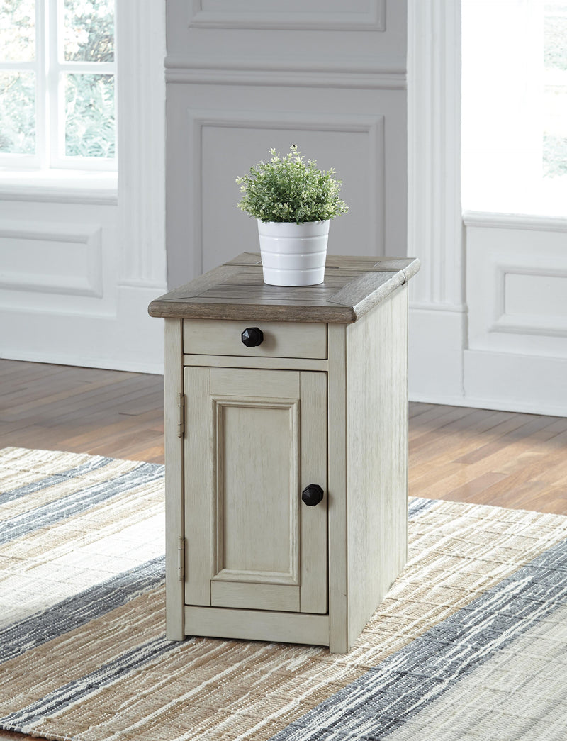 Ashley Furniture Bolanburg chairside end table with USB ports and outlets, featuring a wood finish and modern design.