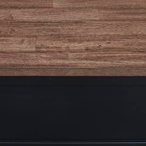 Ashley Furniture Wildenauer lift-top cocktail table with a dark finish, featuring a spacious tabletop and hidden storage compartments.