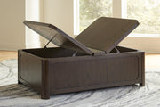 Open view of Ashley Furniture Breckington coffee table with storage, showcasing its sleek design and spacious tabletop.