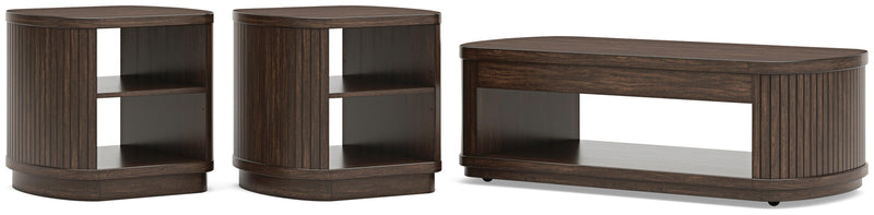 Ashley Furniture Korestone living room set with two modern occasional tables featuring sleek wooden tops and sturdy bases.