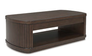 Ashley Furniture Korestone living room table set with multiple tables, modern design, and wood finishes, viewed from an angled perspective.