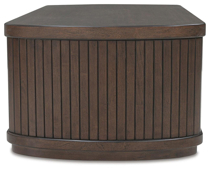 Ashley Furniture Korestone living room occasional table set with two sleek side tables featuring modern wood finish.