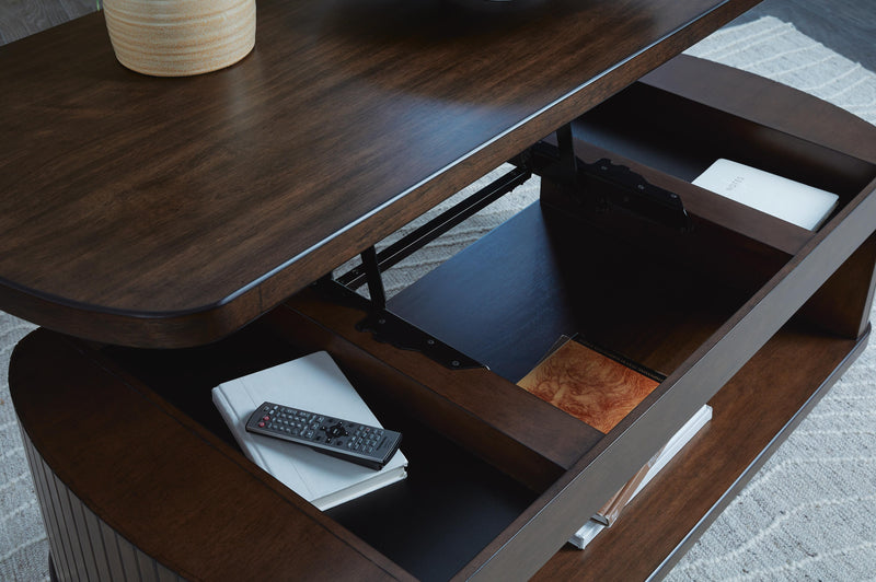 Ashley Furniture Korestone occasional table set with two modern living room tables featuring sleek dark wood finishes.