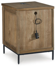 Ashley Furniture Torlanta occasional table set with three stylish tables featuring dark wood finishes and modern design.