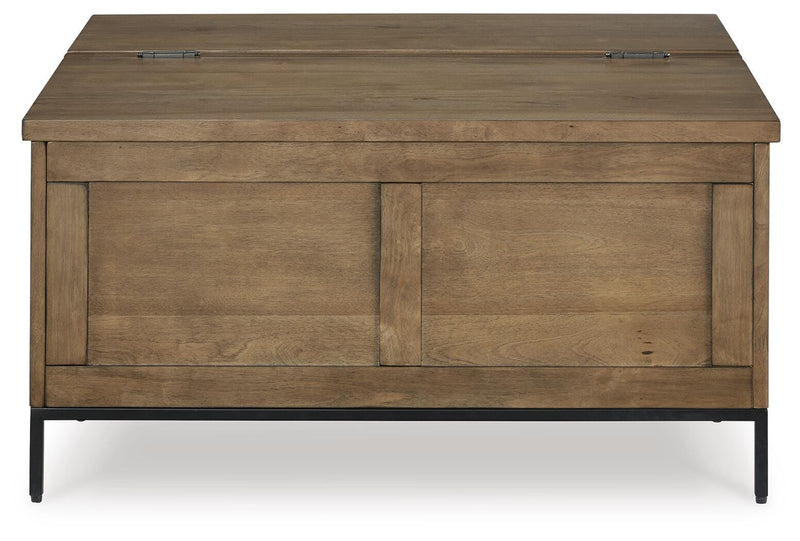 Ashley Furniture Torlanta occasional table set featuring round tables with wooden and metal bases on a neutral background.