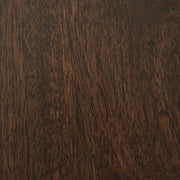 Ashley Furniture Korestone coffee table with a sleek cocktail design and dark finish, featuring a smooth tabletop and modern style.