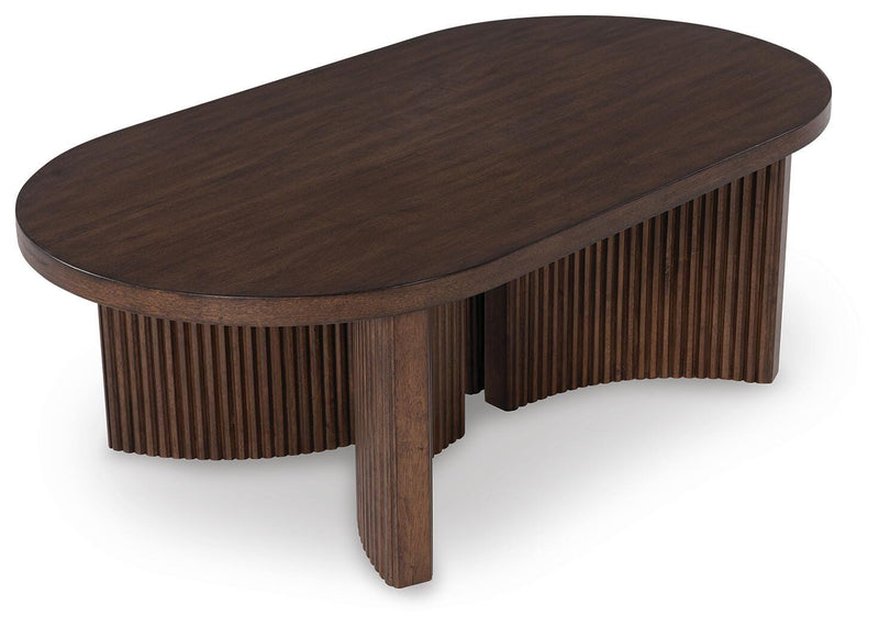 Ashley Furniture Korestone occasional table set with three modern tables featuring sleek wood finishes and minimalist design.