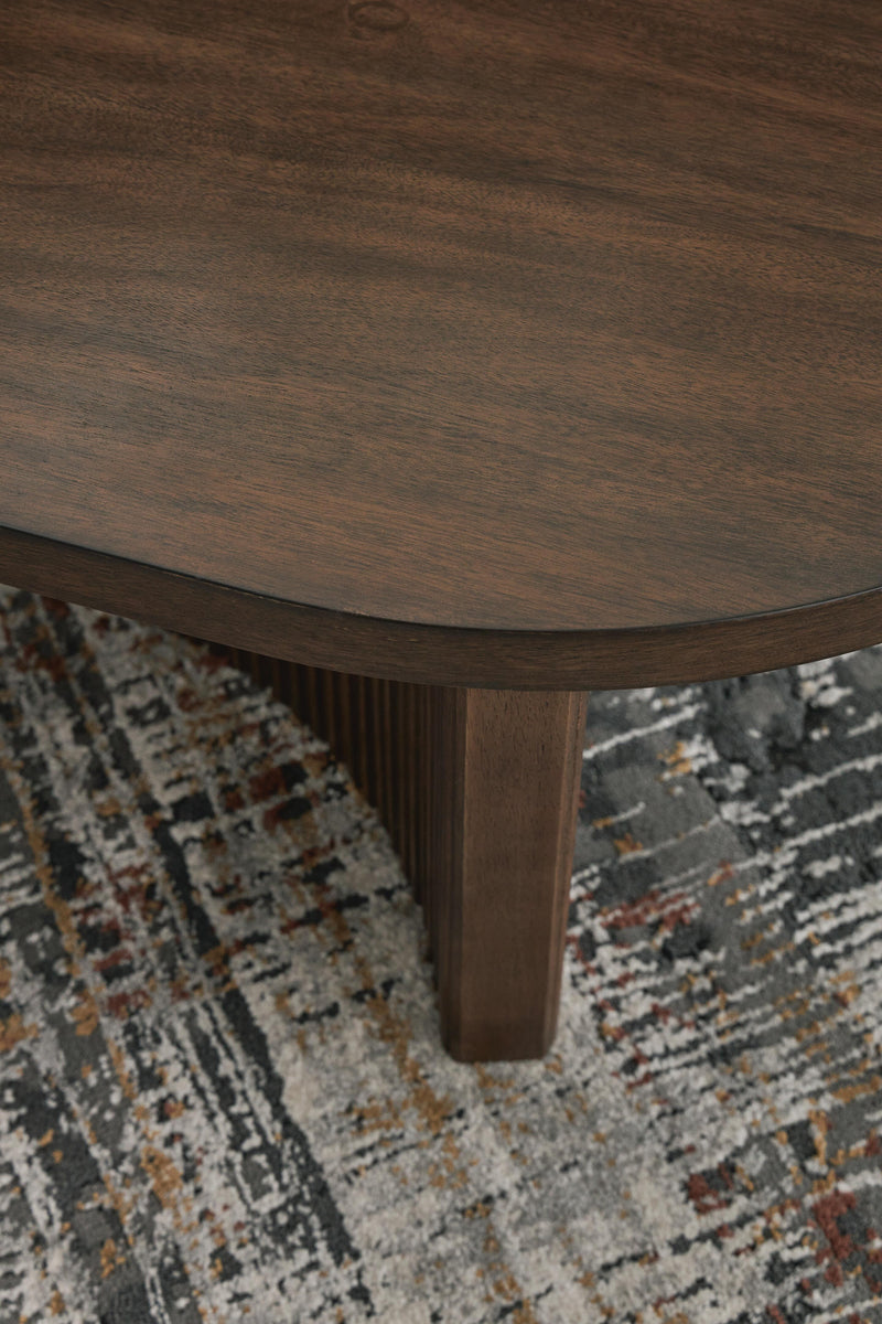 Ashley Furniture Korestone Occasional Table Set with detailed wood tops and sleek design, ideal for living room decor.