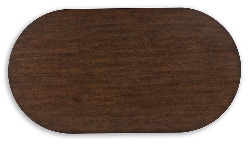 Ashley Furniture Korestone cocktail coffee table with a sleek rectangular top and modern design, perfect for living room decor.