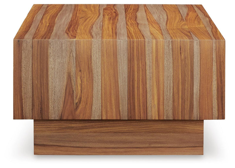 Ashley Furniture Dressonni coffee table with a sleek wooden surface and modern design, shown from the side view.