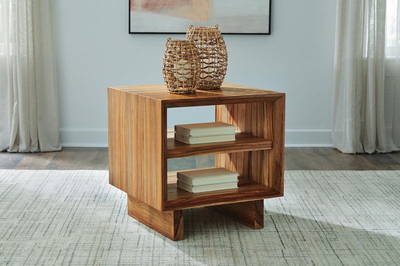 Ashley Furniture Dressonni End Table with a sleek wood finish and modern design, featuring a spacious tabletop and storage drawer.
