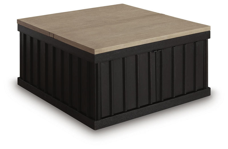 Ashley Furniture Rylandyn lift-top cocktail table with a closed, angled view showing its sleek wooden finish and versatile design.