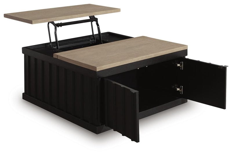 Ashley Furniture Rylandyn Lift-Top Coffee Table with open lift-top displaying storage and tabletop from an angled view.